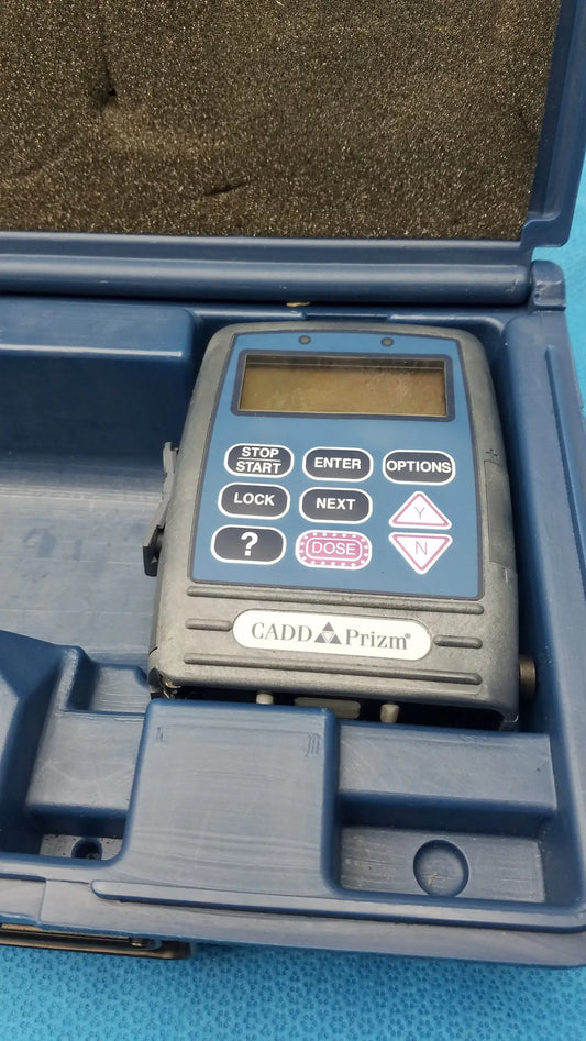 Smiths medical cadd prizm infusion pump with case featuring blue and gray radiation dose meter and digital display