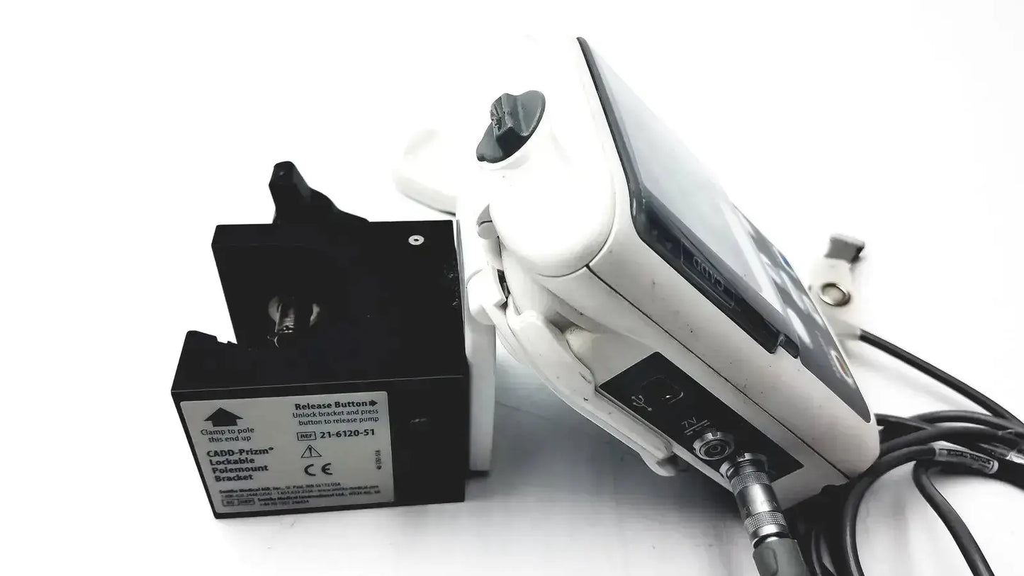 White smiths medical cadd-solis 2110 medical device with black components and attached cables and polemount adapter