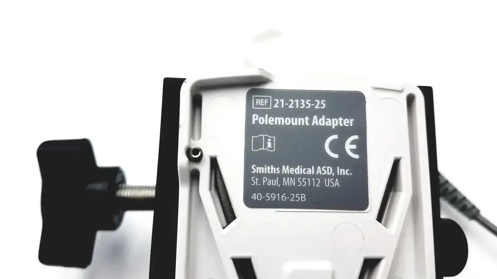 White plastic smiths medical cadd-solis polemount adapter with black accents and labeled smiths medical asd inc