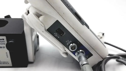 White medical cadd-solis 2110 device by smiths medical with black control panel silver connectors and polemount adapter