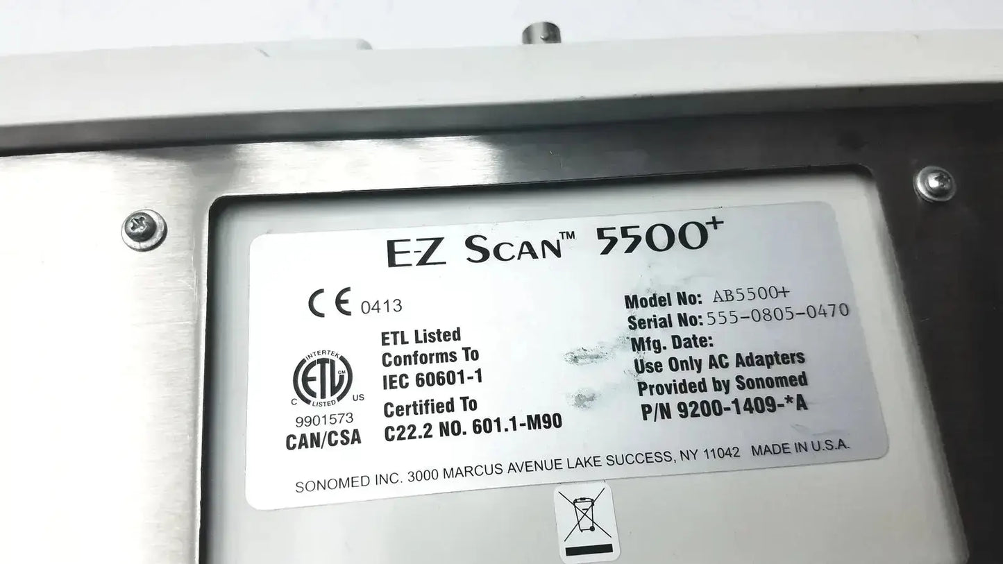 Silver metallic sonomed ab-5500+ ez scan ophthalmic ultrasound device with certification and model information label visible