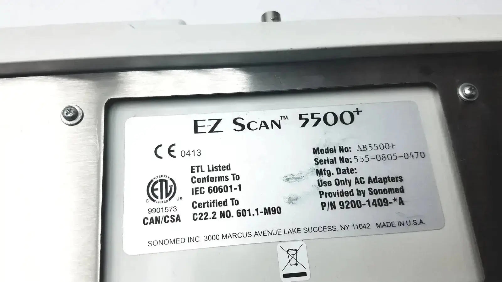 Silver metallic sonomed ab-5500+ ez scan ophthalmic ultrasound device with certification and model information label visible
