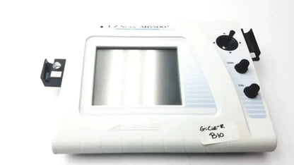 White plastic izsas ar2500 dental curing light with black knobs and rectangular window for sonomed ab-5500+ ez scan ophthalmic ultrasound