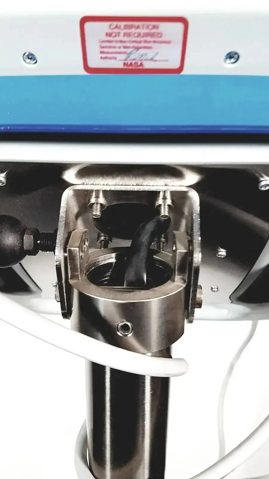 Stainless steel sonosite l38 mhz linear transducer with black internal parts and white tubing on nasa rolling stand