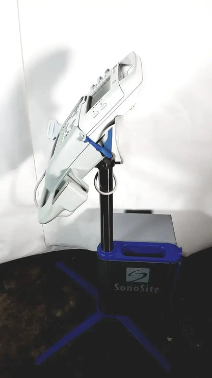 White sonosite l38 ultrasound machine with 10-5 mhz linear transducer mounted on black and blue rolling stand