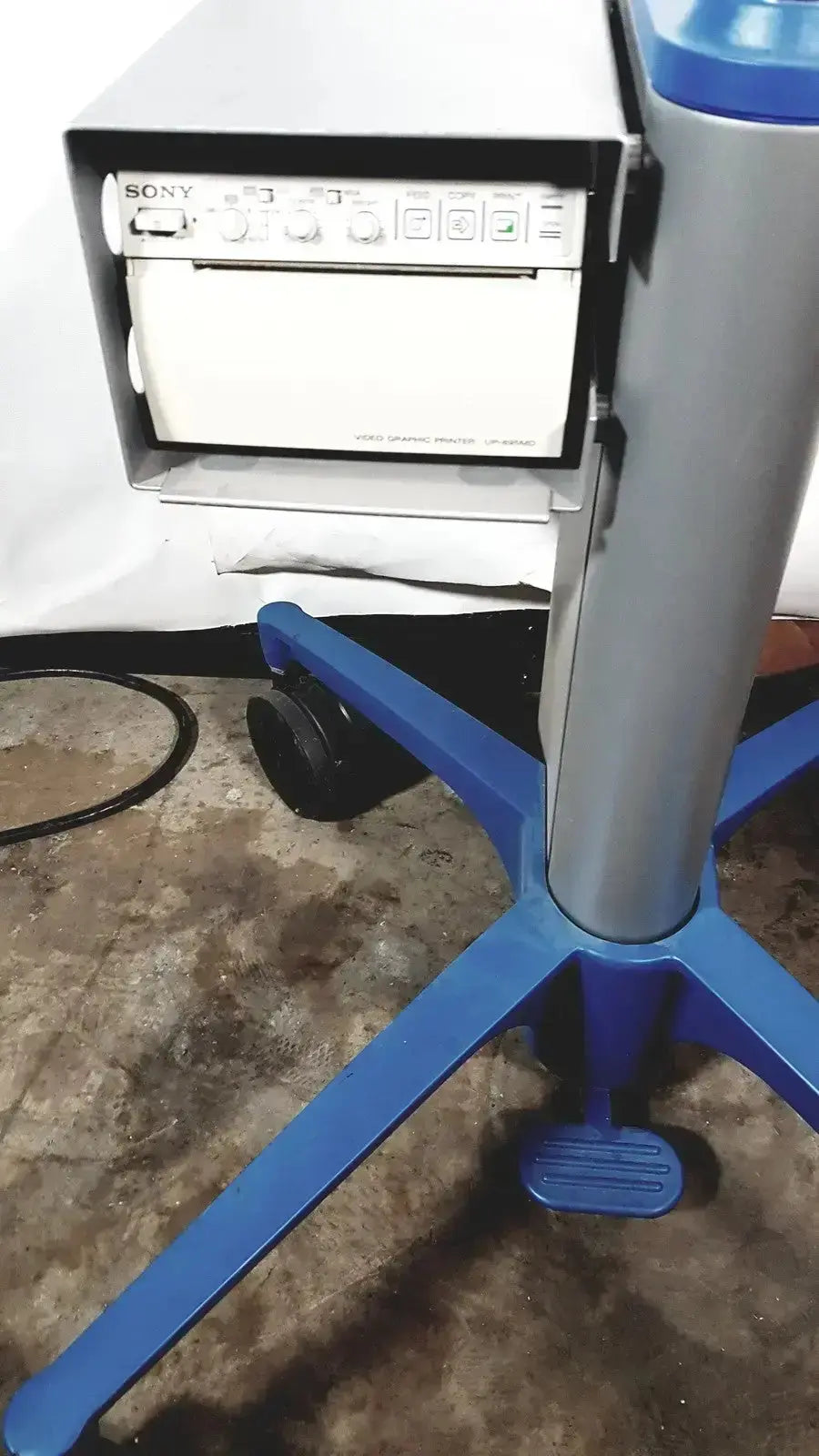 SonoSite l38 mhz linear transducer mounted on blue and gray mobile rolling stand for medical imaging use