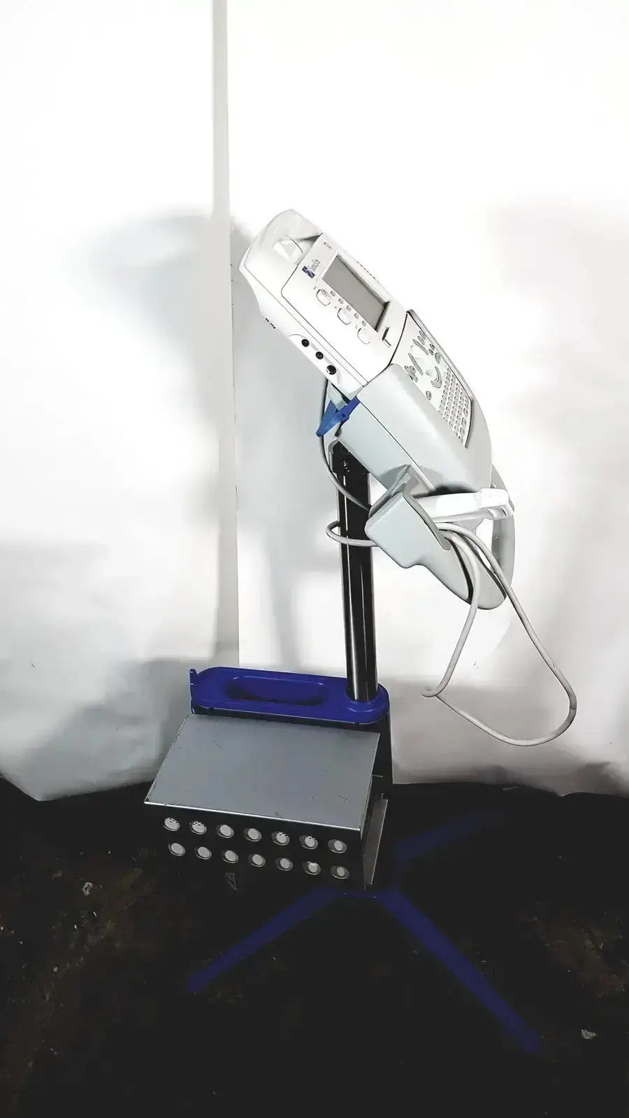 White medical infusion pump on black and blue rolling stand with led lights for sonosite l38 mhz linear transducer P01088-01
