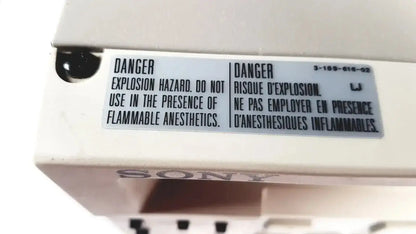 White sony svo-9500md medical svhs vhs videocassette recorder with bilingual safety warning label on front panel