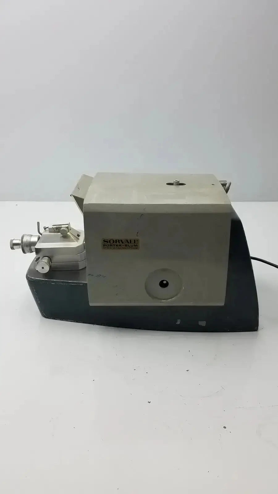 Sorvall porter blum ultra-microtome model MT-2 with beige upper housing black base and metallic components on left side