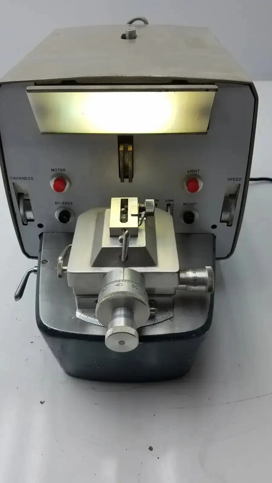 Silver metallic sorvall porter blum ultra-microtome model mt-2 with adjustable knobs and control dials for precision measuring