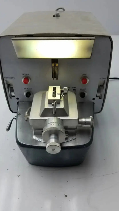 Silver metallic sorvall porter blum ultra-microtome model mt-2 with adjustable knobs and control dials for precision measuring