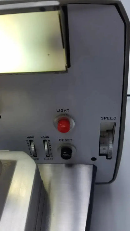 Gray metallic sorvall porter blum ultra-microtome model MT-2 film cutter with red light button and speed dial