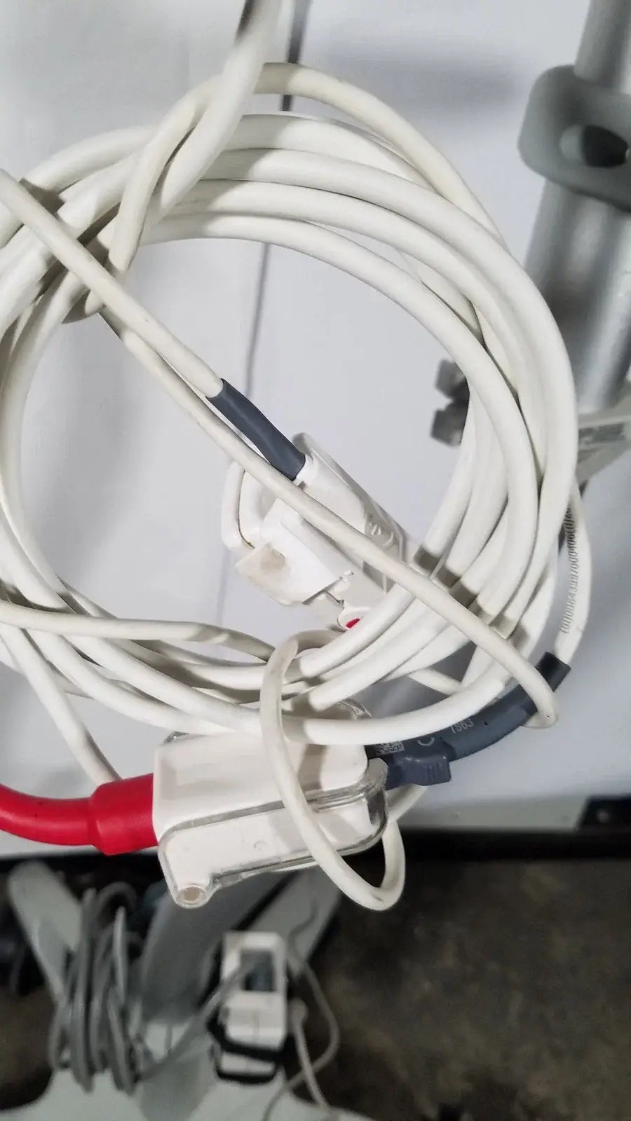Coiled white medical-grade cable with red and black connectors for spacelabs sl 91369 uliview patient monitor with rolling stand medical equipment