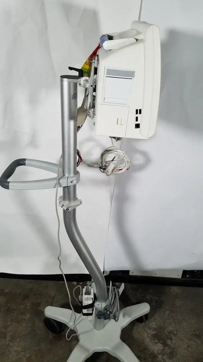 White Spacelabs SL 91369 Ultraview patient monitor mounted on a silver rolling stand for medical equipment use