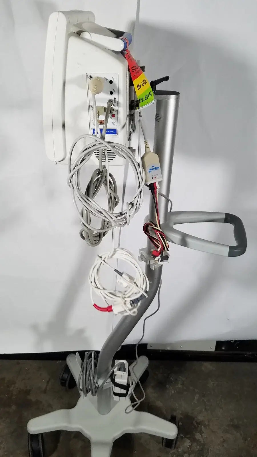 White spacelabs sl 91369 ulerview patient monitor on rolling stand with multiple cables and tubing attached medical equipment