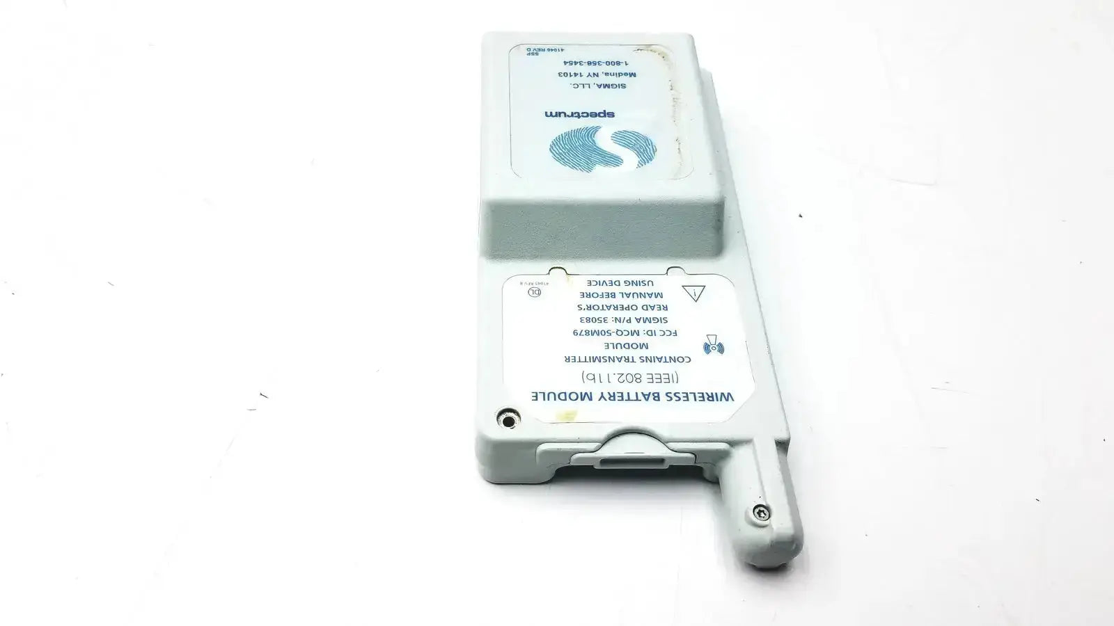 Gray plastic wireless battery module rectangular shaped with printed labels for spectrum wireless battery module ieee 802.11b