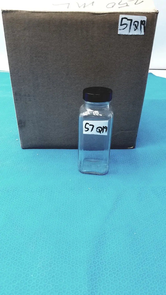 Square glass bottle clear glass spice jar with black lid and white label for reuse medical equipment storage