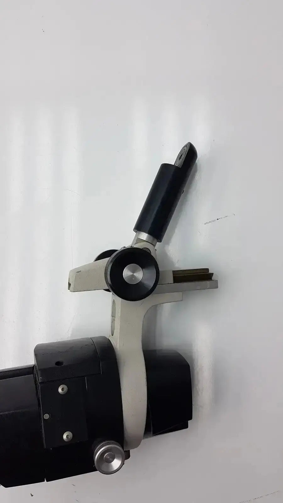 Black and silver Reichert stereo star zoom microscope with adjustable arm and stage for magnification 1X to 6X