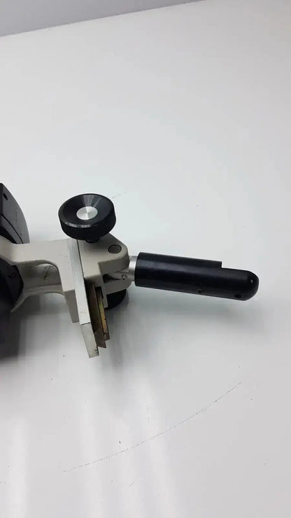 Black and gray handheld laser cutter with rotating adjustment knob for reichert stereo star zoom microscope use