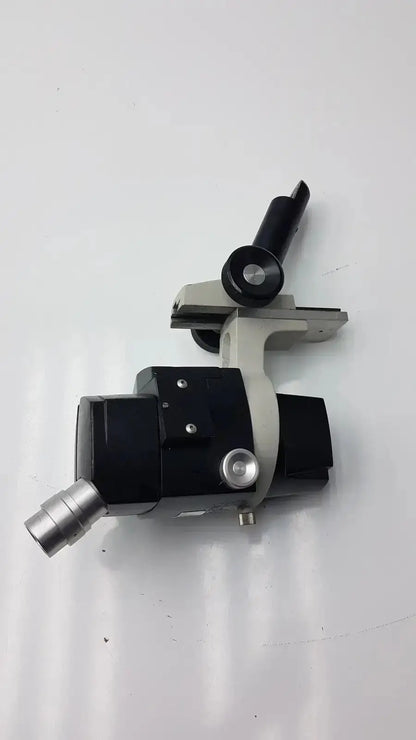 Black and silver Reichert stereo star zoom microscope with adjustable arm and 1X to 6X objective lens for precision viewing