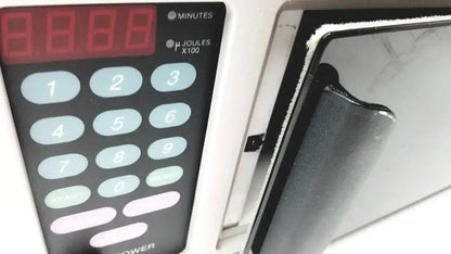 White stratagene uv stratalinker 2400 uv crosslinker with digital keypad red led display and light blue buttons for medical use