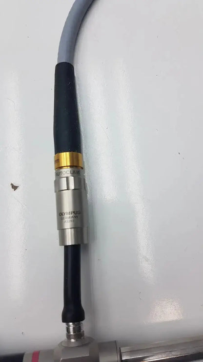 Silver metallic olympus auto-claw laser sensor with black and gold accents connected to gray cable for olumpus germany a3293 autoclavable laparoscope