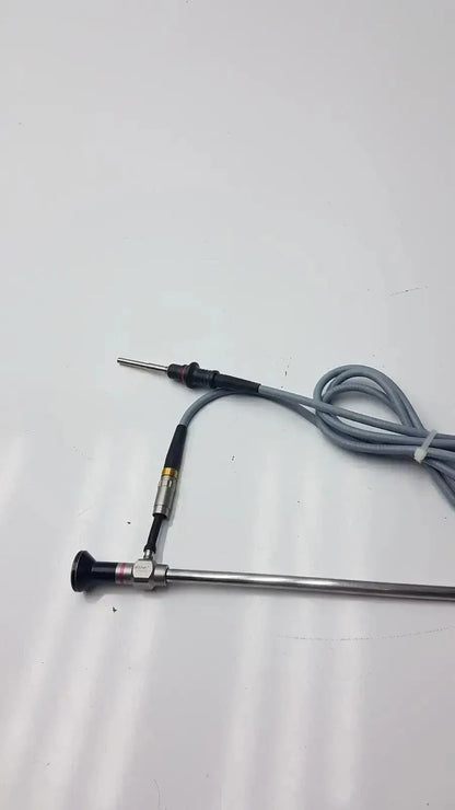 Stryker 0º 380-10 autoclavable laparoscope with metallic body, black handle tip, gray coiled cable by Olumpus Germany A3293