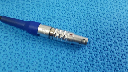Silver metallic connector with blue insulated cable and textured grip on stryker multigen 2 lightweight sterilization box for reuse medical equipment
