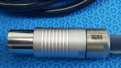 Silver metallic cylindrical sensor with ridged texture and qr code label on the back of stryker 5100-004-000 scher handpiece cable for reuse medical equipment