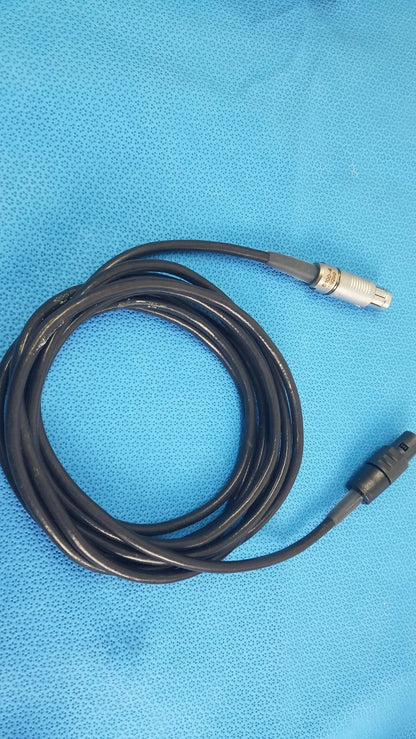 Black coiled medical equipment cable with silver and black connectors for reuse medical equipment scher handpiece cable