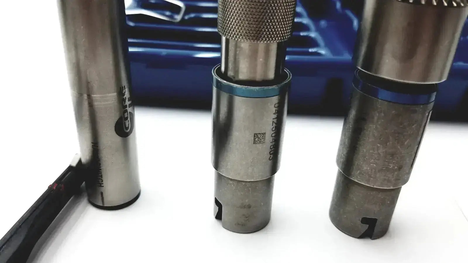 Silver metallic torque wrenches with textured grips and blue accents in stryker 5400-277 core sterilization case