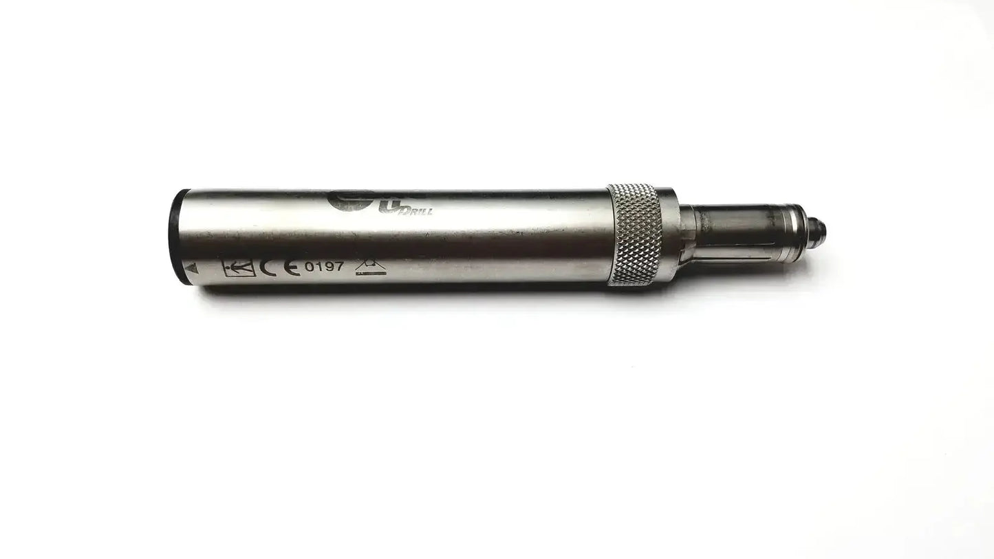 Silver metallic vape pen with textured grip and clear glass tank shown in Stryker 5400-277 core sterilization case for drill set
