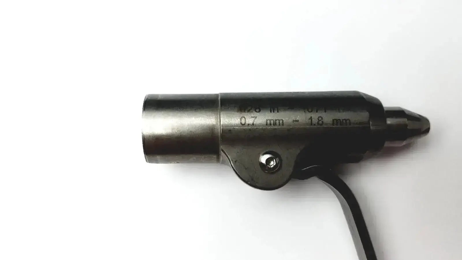 Precision black and silver metal drill bit with engraved measurements in stryker 5400-277 core sterilization case