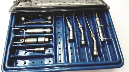 Blue plastic stryker 5400-277 core sterilization case with metallic dental handpieces and drill attachments