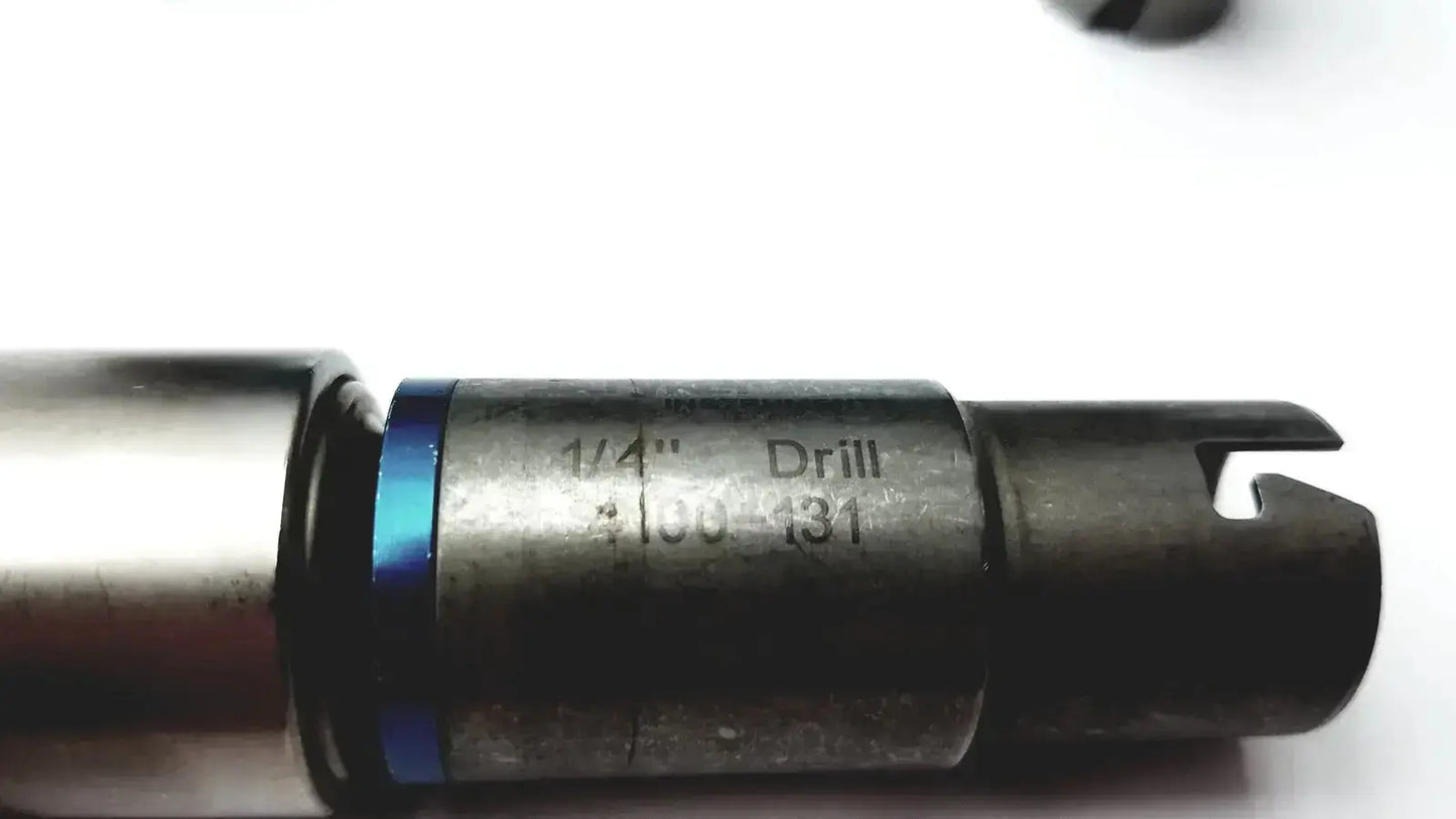 Black metal drill bit with blue ring and engraved markings included in stryker 5400-277 core sterilization case with all attachments