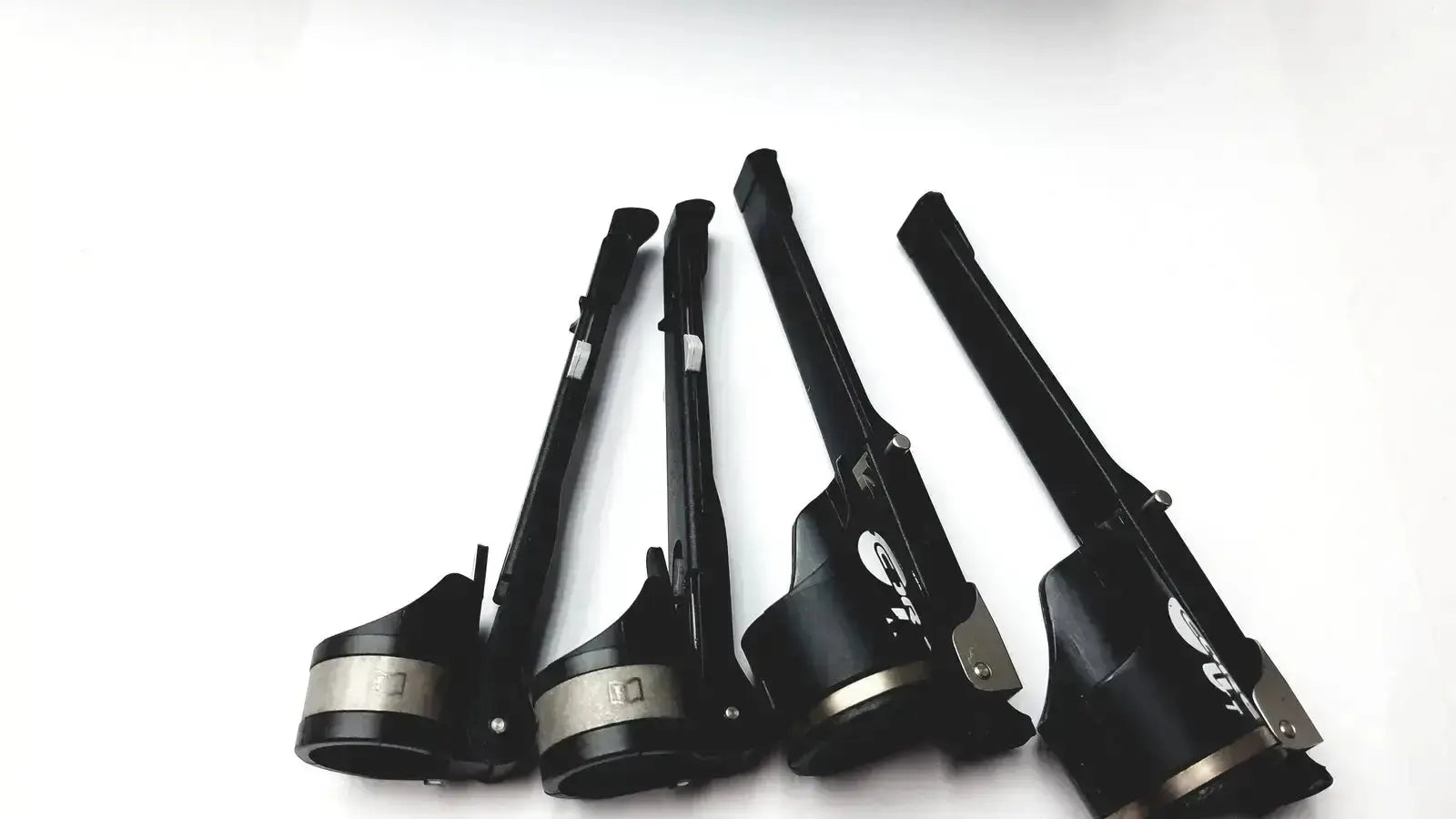 Black and silver industrial-grade impact wrenches with ergonomic handles in stryker 5400-277 core sterilization case