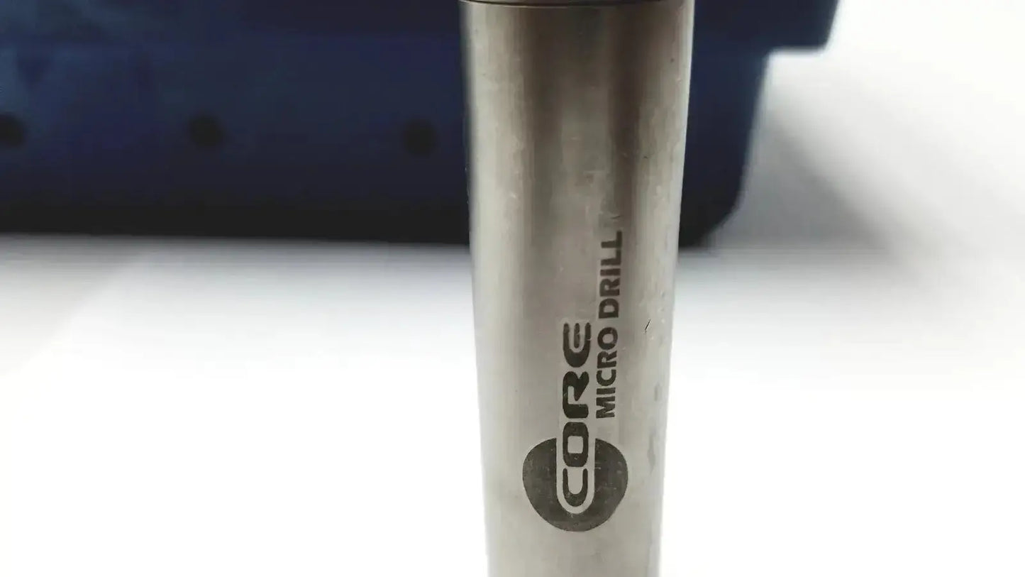 Silver metallic cylindrical core micro drill bit with engraved branding for stryker 5400-277 core sterilization case