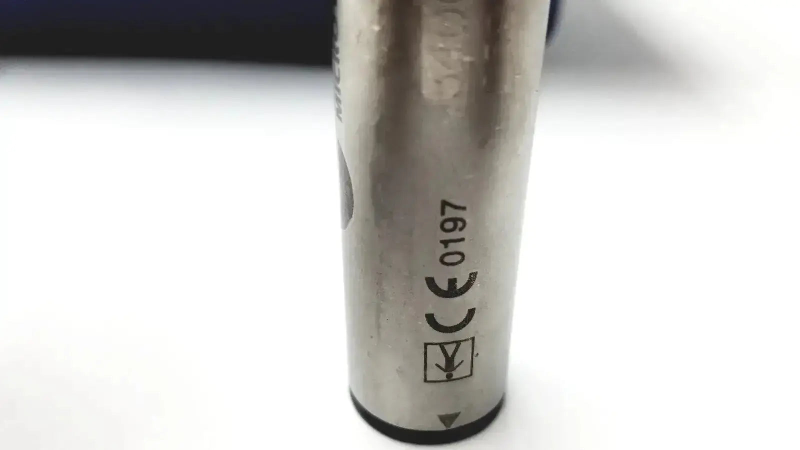 Silver cylindrical battery with embossed markings and black base for stryker 5400-277 core sterilization case