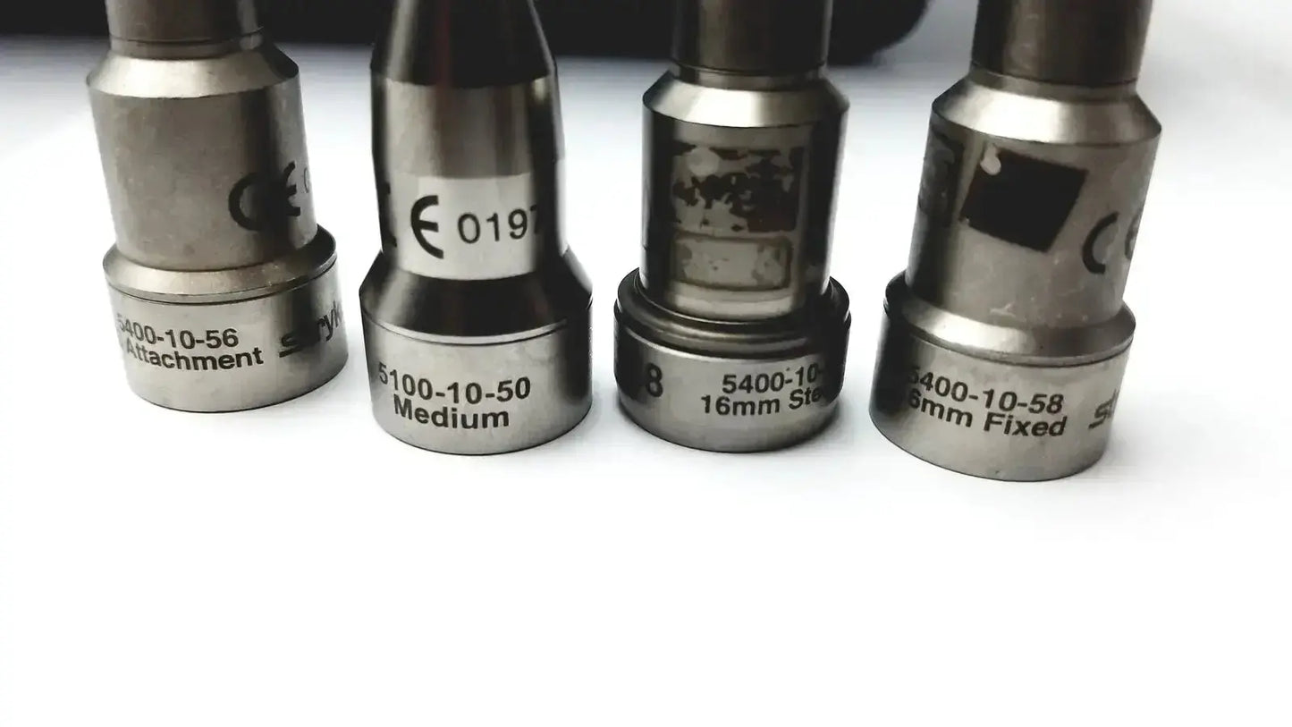 Set of four metallic camera lens adapters with engraved specifications for stryker 5400-277 core sterilization case