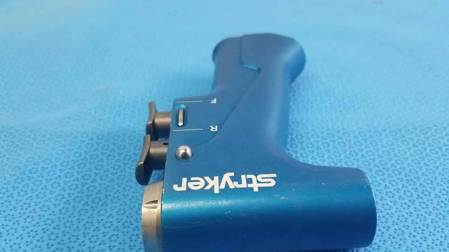 Blue stryker surgical instrument with metallic accents and labeled controls for reuse medical equipment by smiths medical