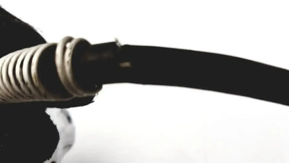 Black coiled hose with metallic threaded connector showing cord damage on stryker 8381-210 autopsy saw for biomedical technicians hospital surplus