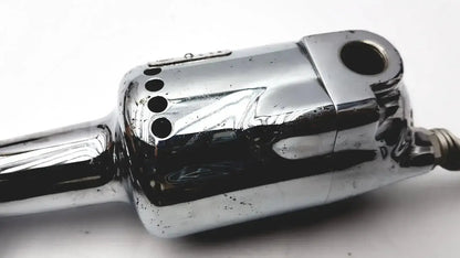 Chrome-finished autopsy saw with sleek metallic body and ventilation holes for biomedical technicians hospital surplus