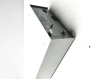 Gray metal electrical panel with label and mounting hardware on the back side of stryker coer powered instrument driver