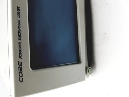 Gray plastic stryker powered instrument driver with dark blue screen and black vertical text core powered instrument driver