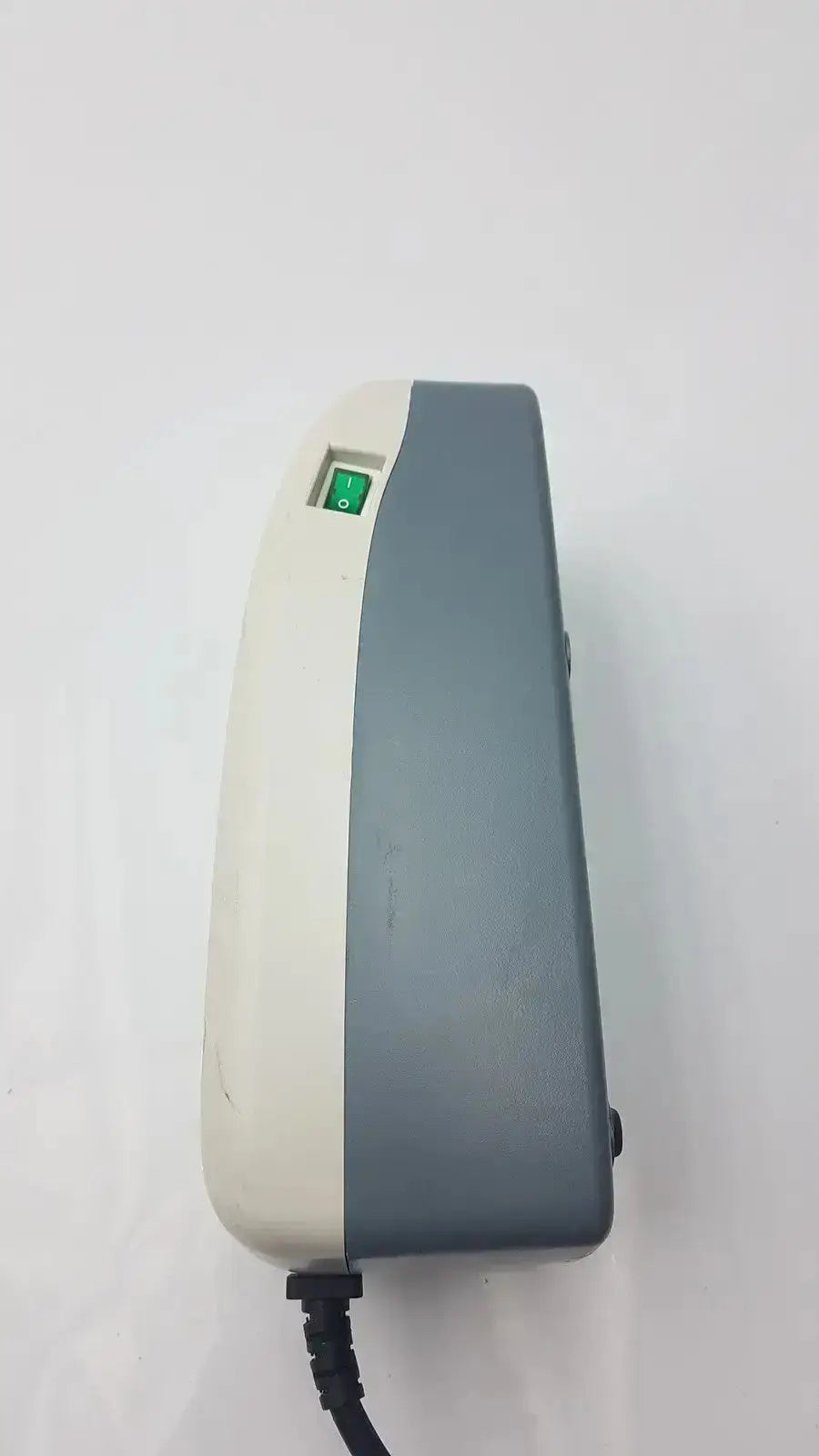 Gray and off-white plastic stryker companion pump 2.0 model 2781 with green power switch for medical use