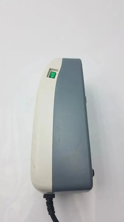 Gray and off-white plastic stryker companion pump 2.0 model 2781 with green power switch for medical use