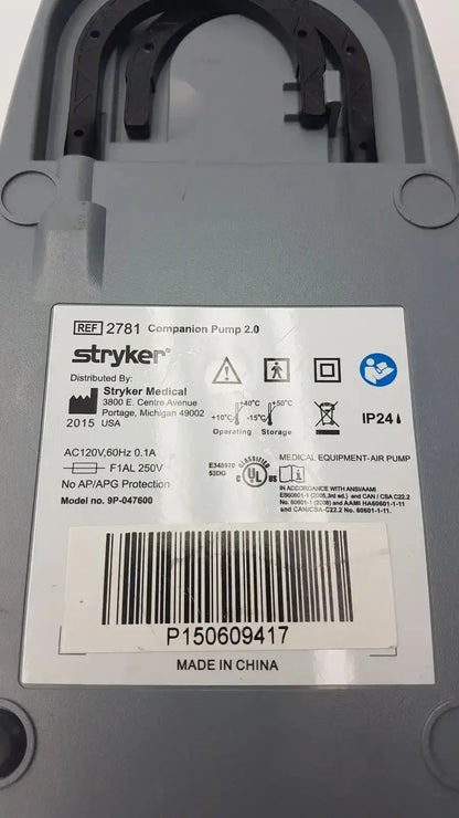 Gray plastic stryker companion pump 2.0 model 2781 with technical specification sticker on the back side