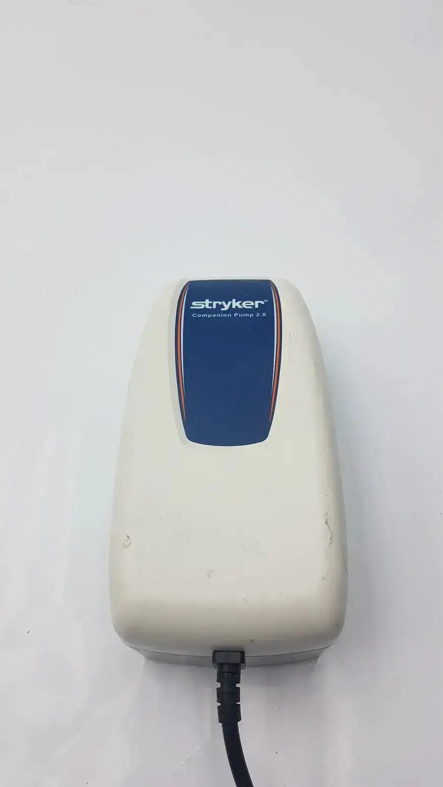 Cream-colored stryker companion pump 2.0 model 2781 with blue label and black power cord for medical use