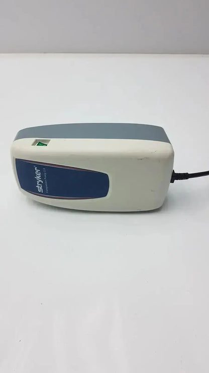 Stryker companion pump 2.0 model 2781 cerebral suture device with gray off-white plastic body and blue branding label