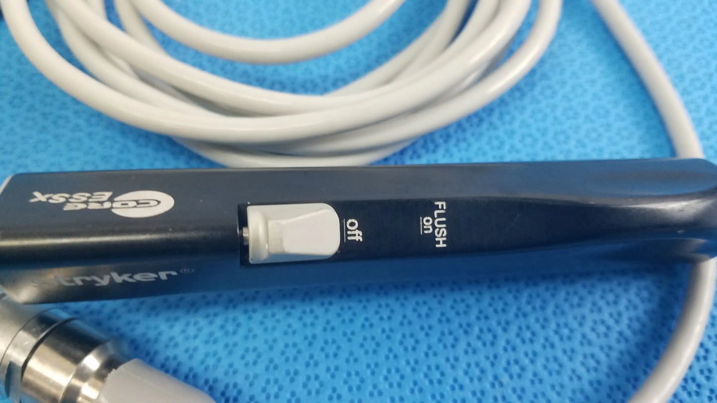 Black Stryker ESSx microdebrider handpiece with white toggle switch off flush for reuse medical equipment by Smiths Medical
